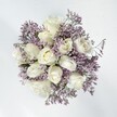 This bouquet embodies serene elegance-a harmonious blend of creamy white roses and wisps of delicate lavender statice, thoughtfully arranged for the community of Tulse Hill. Each rose is full and velvety, the petals opening in gradual, graceful layers, while the statice curls in fine, papery branches reminiscent of spring flowers along Norwood Hill. The result is quietly captivating: a chalky, dreamy palette highlighted by gentle natural light, bringing a sense of hope and renewal ideal for weddings, anniversaries, or heartfelt celebrations. The subtle contrast between the soft roses and the textured statice crafts an image of tranquil romance, as if time stands still for just a moment, much like the peaceful pauses in local parks. A gentle, powdery fragrance lingers, evoking spring mornings and the comfort of home. In this arrangement, the promise of sincerity and enduring affection is unmistakable-each stem expressing the artistry and intention of local florists who take pride in serving the Tulse Hill neighbourhood with care and heart.